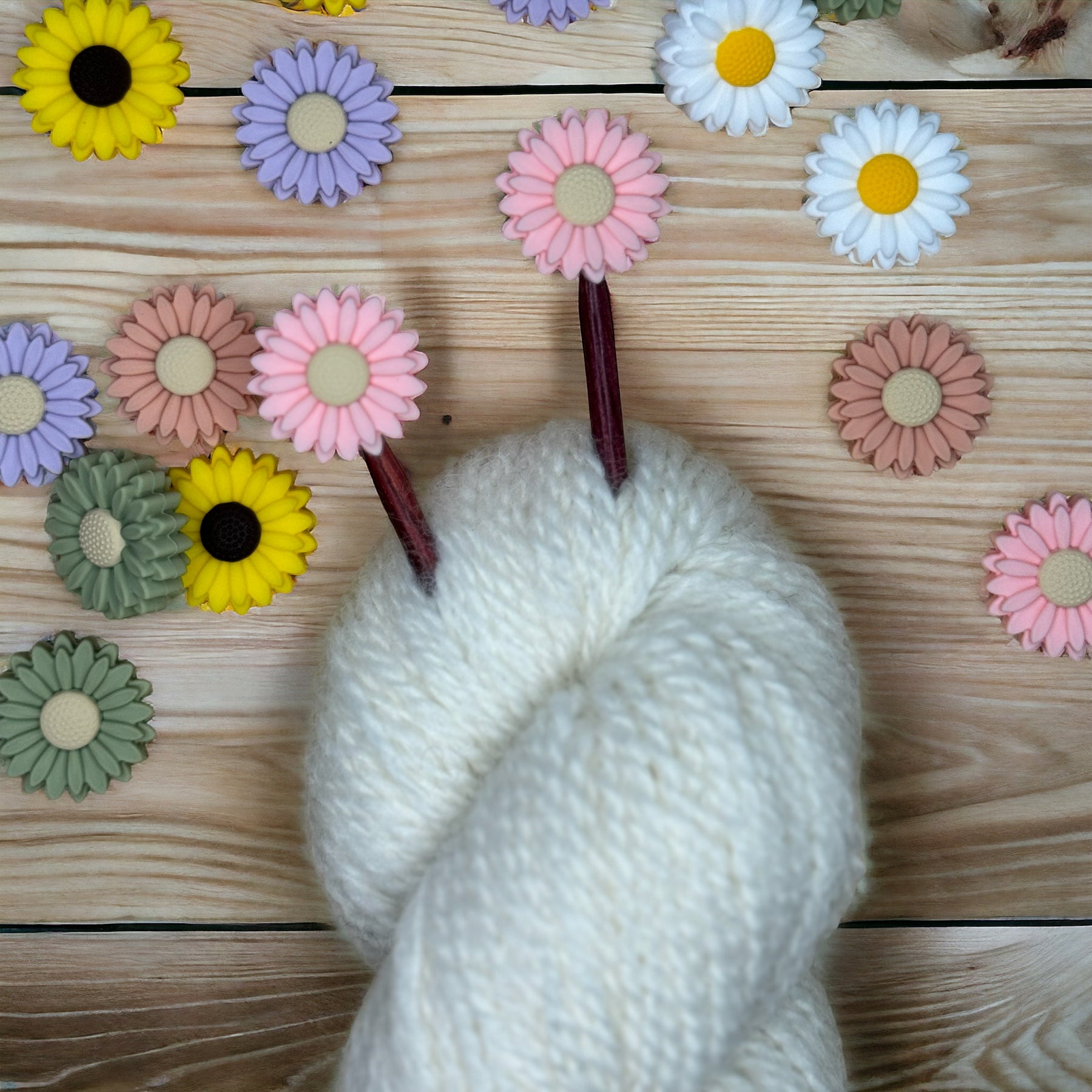 Daisy Needle Stoppers